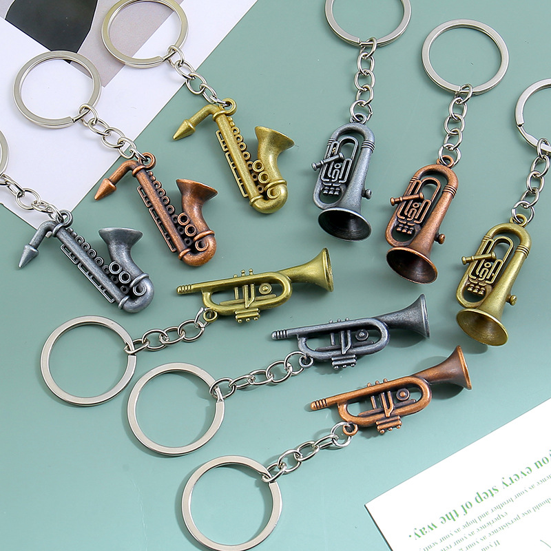 Musical Instrument All - Portachiavi a forma di sassofoni creativi